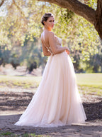 Robe longue en tulle avec corset orné d'appliques