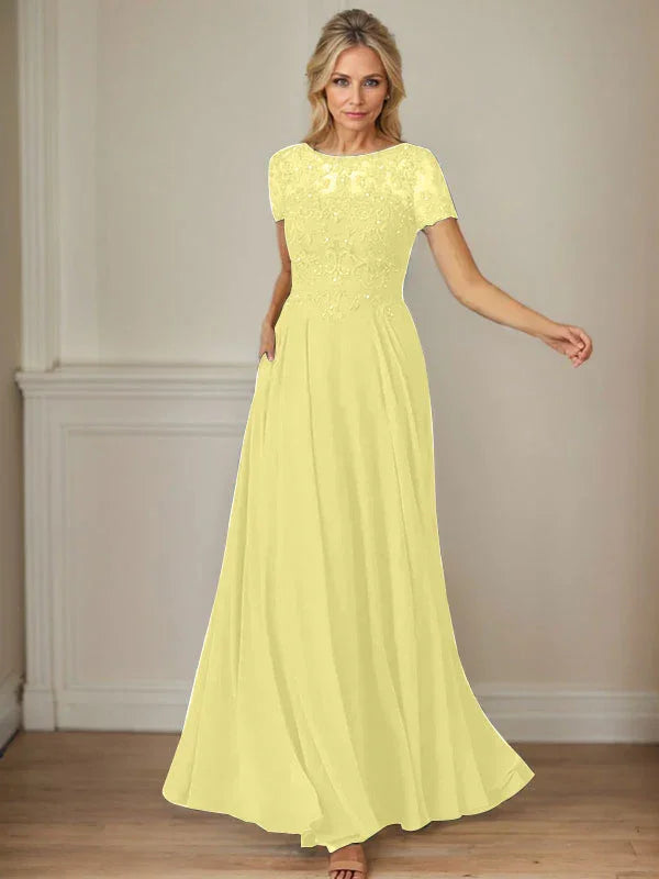 فستان شيفون كحلي داكن برقبة قارب وتطريز بالترتر على شكل حرف A