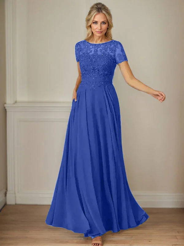 فستان شيفون كحلي داكن برقبة قارب وتطريز بالترتر على شكل حرف A