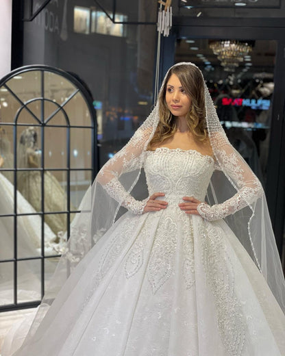 Deluxe bodenlanges, langärmliges A-Linien-Brautkleid aus Spitze mit Rüschen