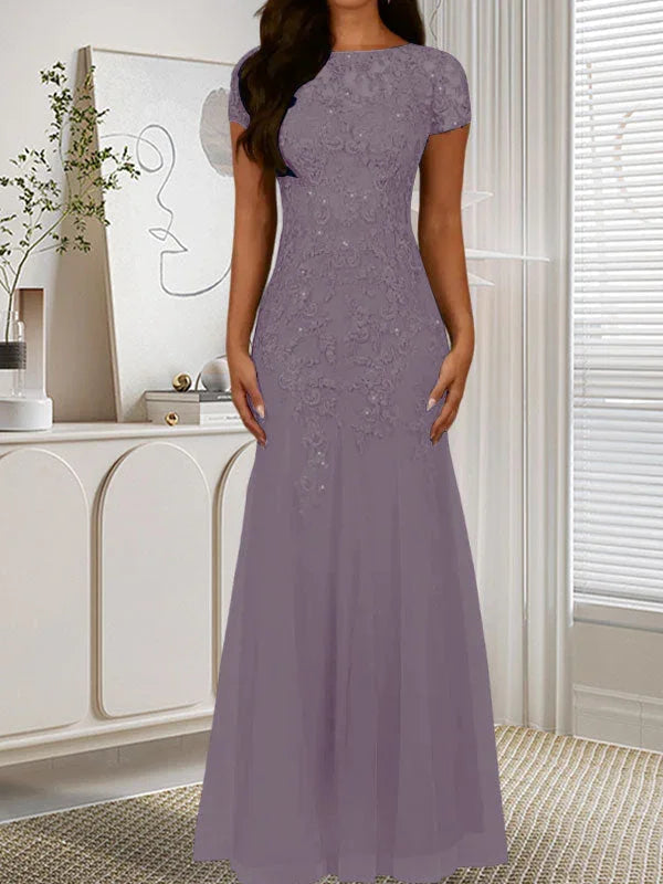 فستان تول مزين بحراشف لامعة برقبة دائرية بلون كحلي داكن على شكل حورية البحر