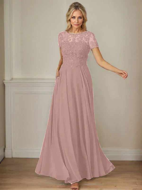 فستان شيفون كحلي داكن برقبة قارب وتطريز بالترتر على شكل حرف A