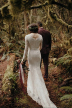 فساتين زفاف أنيقة بدانتيل على شكل حورية البحر بياقة دائرية وأكمام طويلة