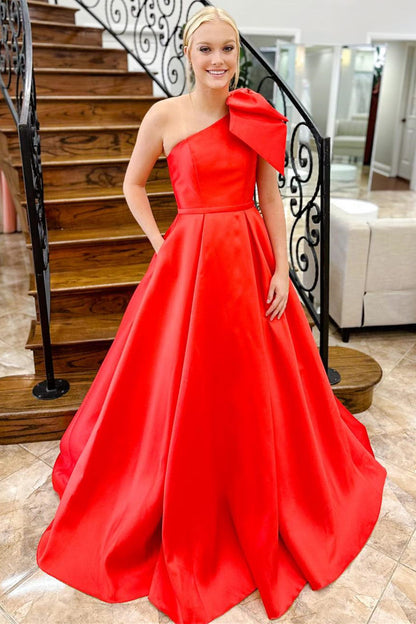 Vestido de fiesta de satén con lazo de un hombro y bolsillos