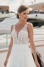 Flowing Long Ivory V-Neck Sleeveless A-Line Wedding Dress With Appliques