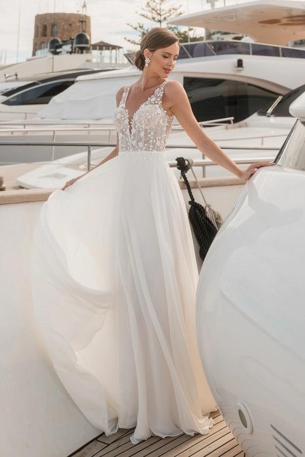 Flowing Long Ivory V-Neck Sleeveless A-Line Wedding Dress With Appliques