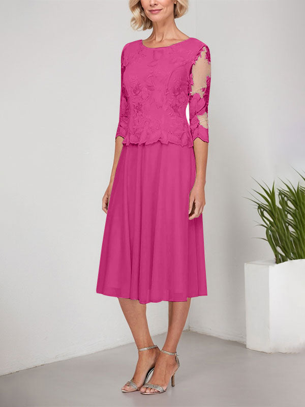 Robe de mère de la mariée en dentelle et mousseline, longueur thé, en ligne A avec décolleté en cœur et broderie