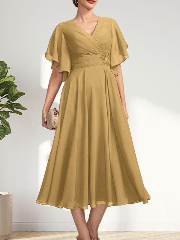 A-Linie, V-Ausschnitt, knielang, Chiffonkleid für die Brautmutter mit plissierten Perlen