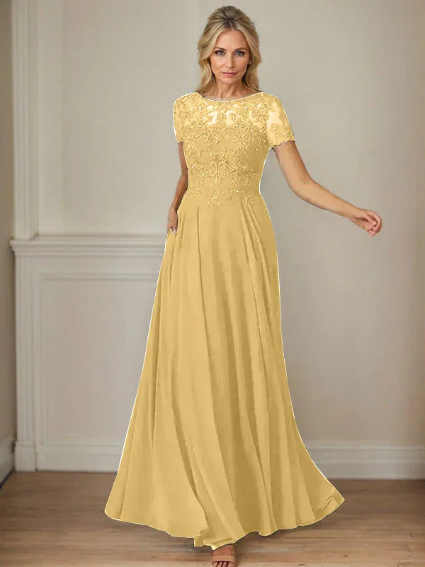 فستان شيفون كحلي داكن برقبة قارب وتطريز بالترتر على شكل حرف A