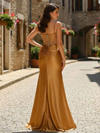 Gold Rhinestone Satin Corset Prom Dress With Sheer Bodice And Slit