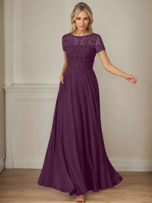 فستان شيفون كحلي داكن برقبة قارب وتطريز بالترتر على شكل حرف A