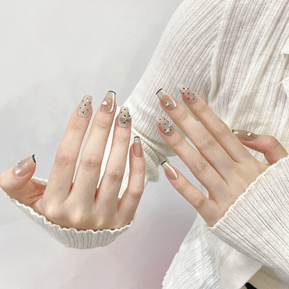 Nuevas uñas postizas de alta calidad estilo Hepburn con diseño de mariposa, diamantes y lunares, versátiles para mujer, con simulación de maquillaje 