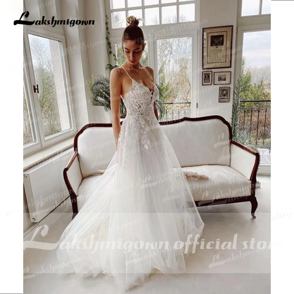 A Line V Neck Tulle Bridal Dress With Lace Appliques And Beaded Trimmings