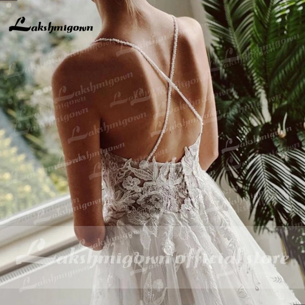 A Line V Neck Tulle Bridal Dress With Lace Appliques And Beaded Trimmings