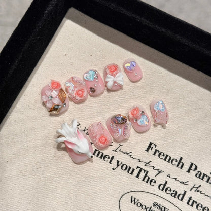 Nuevo estilo de uñas postizas de lujo con purpurina, cortas, con lazo, corazón y diamante. 