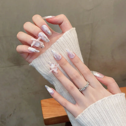 Uñas postizas reutilizables de gel con diseño de ojo de gato y mariposas. 