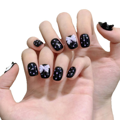 Nuevo estilo de uñas cortas con lazo de lunares moldeadas a mano en 3D 