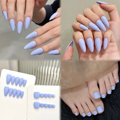 Uñas prensadas hechas a mano, sencillas y elegantes, con forma de almendra en morado claro para uso diario. 