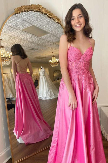 Pinkes A-Linien-Ballkleid mit Blumenapplikationen und Schnürung