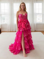 Hot Pink Tiered Sequin Ruffle Prom Dress With Oversized Satin Bow And Slit