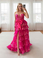 Hot Pink Tiered Sequin Ruffle Prom Dress With Oversized Satin Bow And Slit
