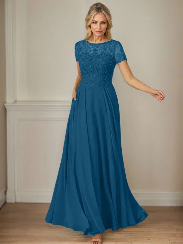 فستان شيفون كحلي داكن برقبة قارب وتطريز بالترتر على شكل حرف A