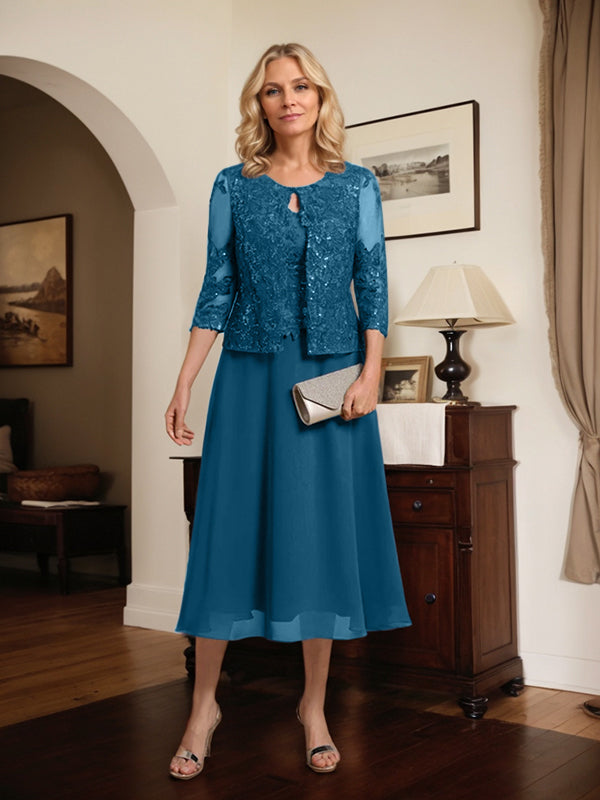 Robe de mère de la mariée en dentelle et mousseline, longueur thé, en ligne A, décolleté arrondi, ornée de paillettes