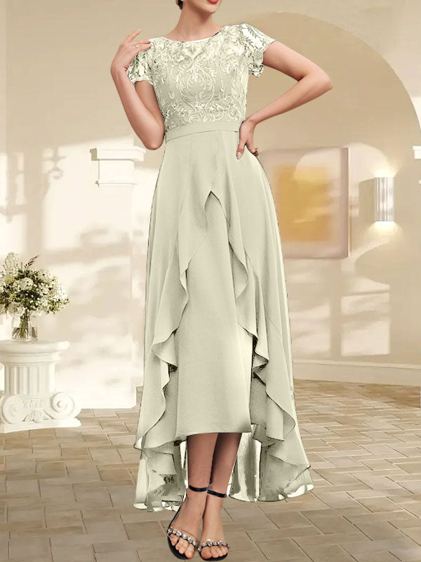 Robe de mère de la mariée en mousseline et dentelle asymétrique illusion à encolure dégagée, coupe en A, avec nœud, volants et paillettes