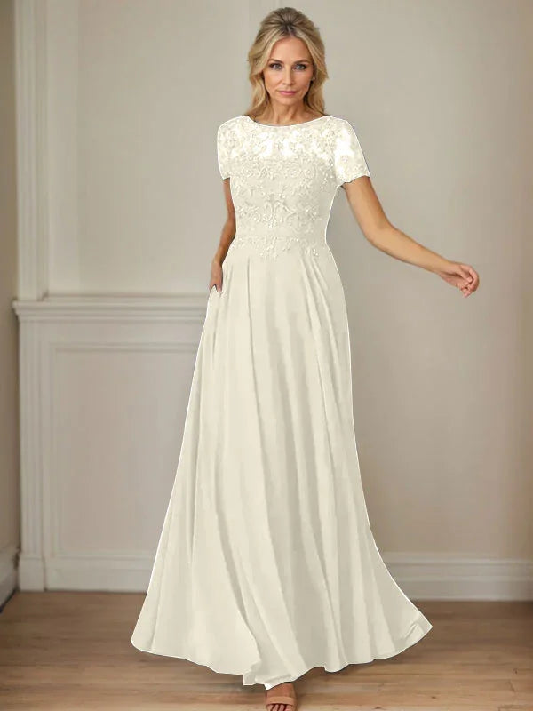 فستان شيفون كحلي داكن برقبة قارب وتطريز بالترتر على شكل حرف A