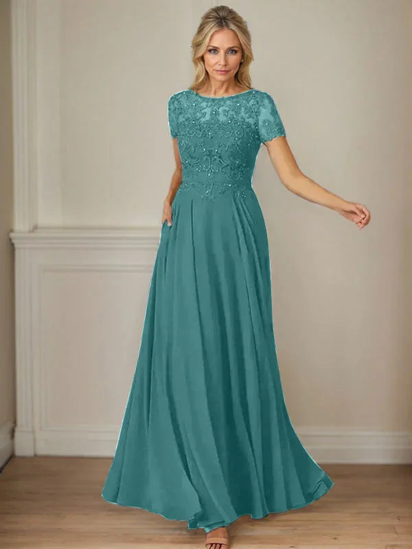 فستان شيفون كحلي داكن برقبة قارب وتطريز بالترتر على شكل حرف A