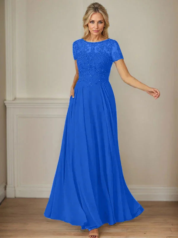 فستان شيفون كحلي داكن برقبة قارب وتطريز بالترتر على شكل حرف A