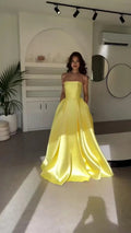 Robe de bal longue jaune élégante en satin, sans bretelles, coupe évasée, avec poches Y8469