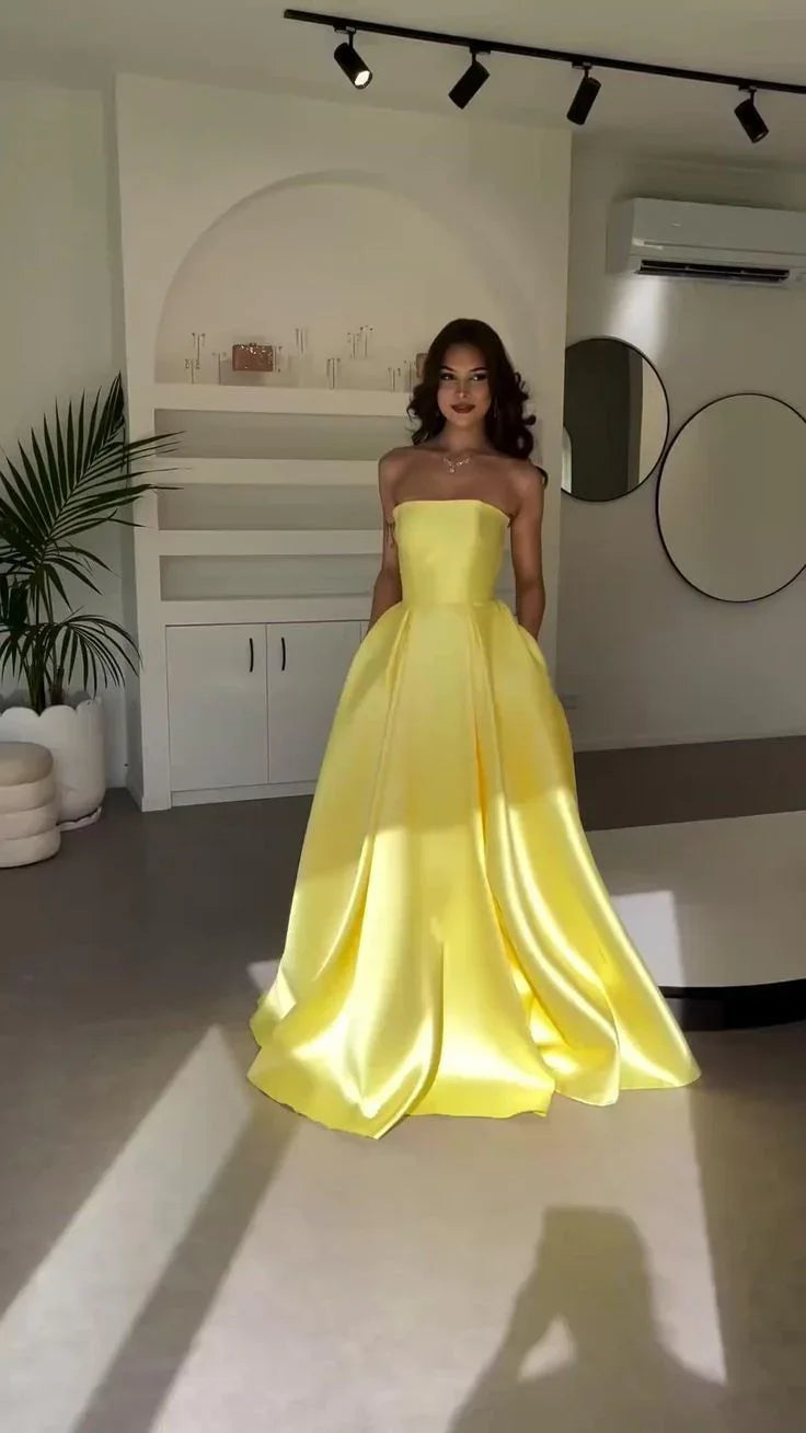 Robe de bal longue jaune élégante en satin, sans bretelles, coupe évasée, avec poches Y8469