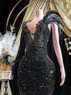 Abito da sera lungo a sirena con maniche lunghe, applicazione di paillettes nere e strass Y8313