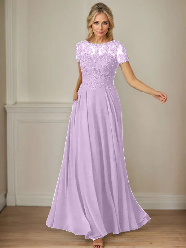 فستان شيفون كحلي داكن برقبة قارب وتطريز بالترتر على شكل حرف A