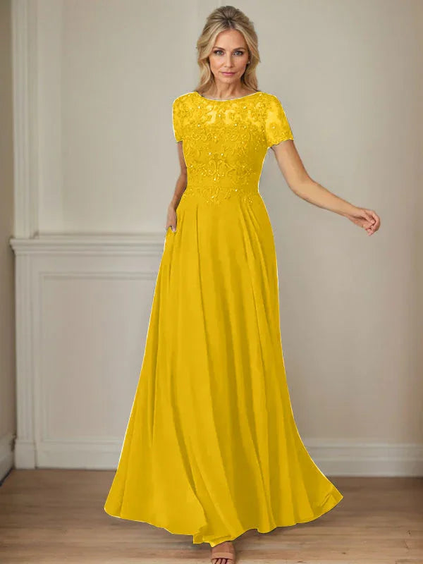 فستان شيفون كحلي داكن برقبة قارب وتطريز بالترتر على شكل حرف A