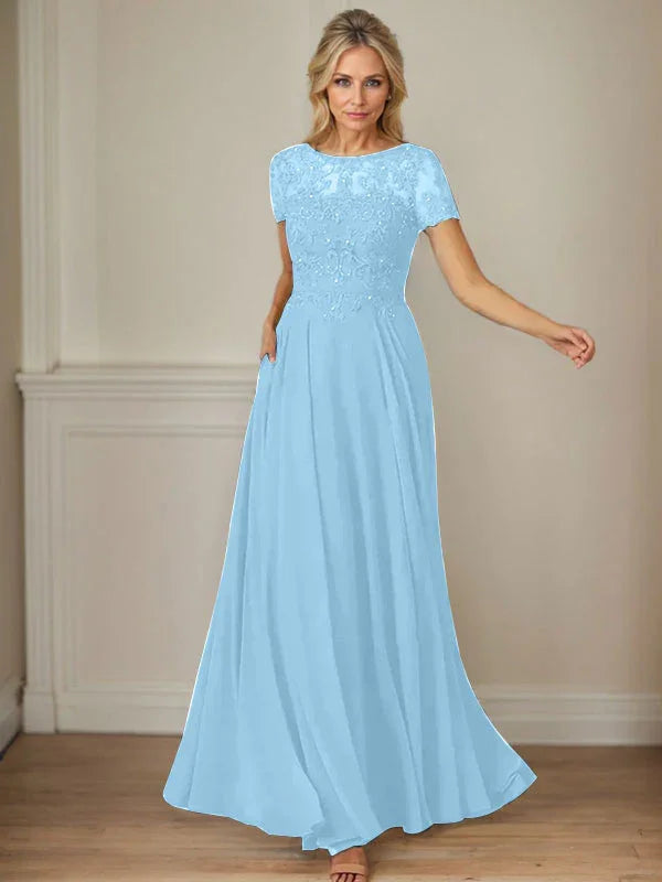 فستان شيفون كحلي داكن برقبة قارب وتطريز بالترتر على شكل حرف A