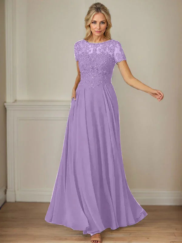 فستان شيفون كحلي داكن برقبة قارب وتطريز بالترتر على شكل حرف A