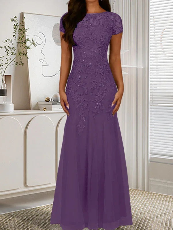 فستان تول مزين بحراشف لامعة برقبة دائرية بلون كحلي داكن على شكل حورية البحر