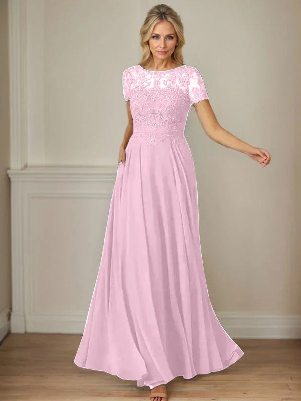 فستان شيفون كحلي داكن برقبة قارب وتطريز بالترتر على شكل حرف A