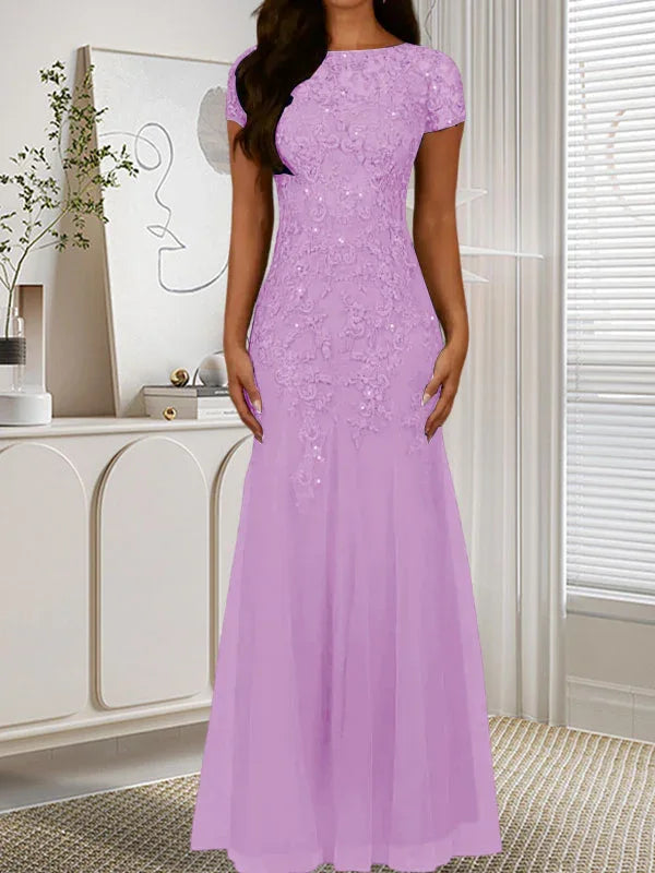 فستان تول مزين بحراشف لامعة برقبة دائرية بلون كحلي داكن على شكل حورية البحر