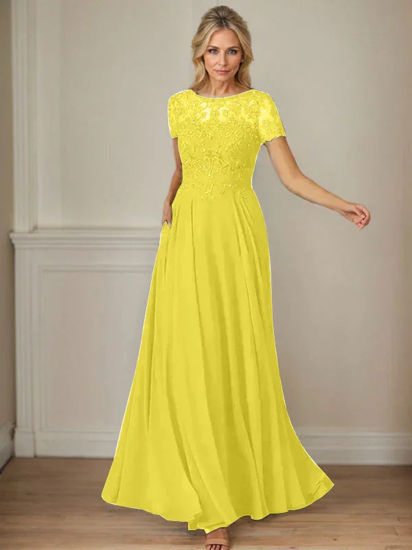 فستان شيفون كحلي داكن برقبة قارب وتطريز بالترتر على شكل حرف A