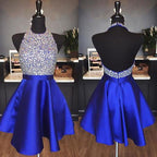 Abito da cerimonia blu reale in raso, senza schiena, con gioielli, collo ad anello, paillettes e cristalli