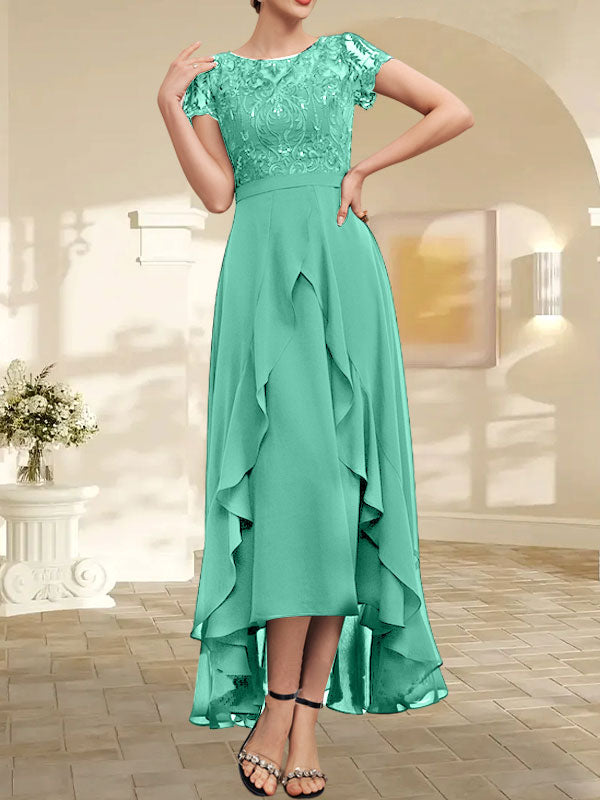 Robe de mère de la mariée en mousseline et dentelle asymétrique illusion à encolure dégagée, coupe en A, avec nœud, volants et paillettes