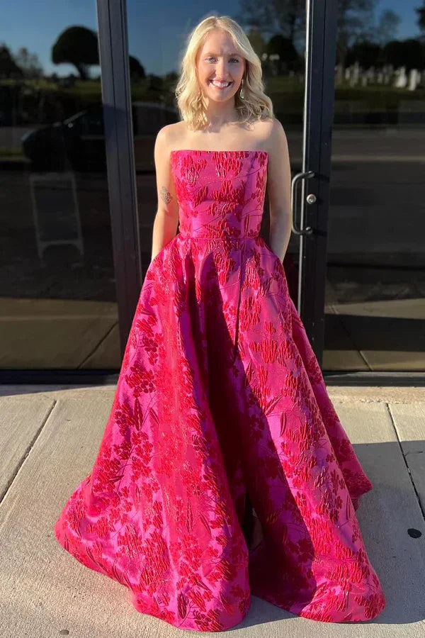 Vestido de noite elegante em cetim com estampado floral, rosa choque, sem alças, corte em linha A, com bolsos Y8036