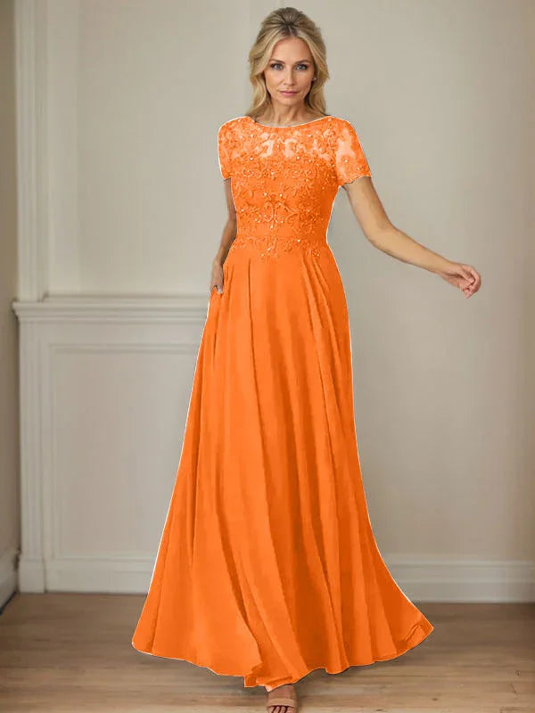 فستان شيفون كحلي داكن برقبة قارب وتطريز بالترتر على شكل حرف A