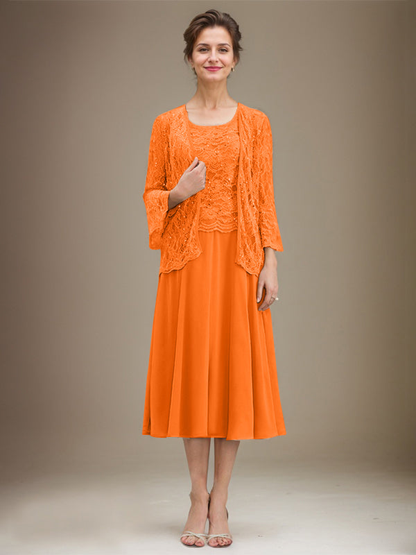 Robe de mère de la mariée en dentelle et mousseline, longueur thé, en ligne A, décolleté arrondi, ornée de paillettes