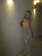 Abito lungo da sera e da ballo con spalline sottili, paillettes color champagne, modello aderente Y8083