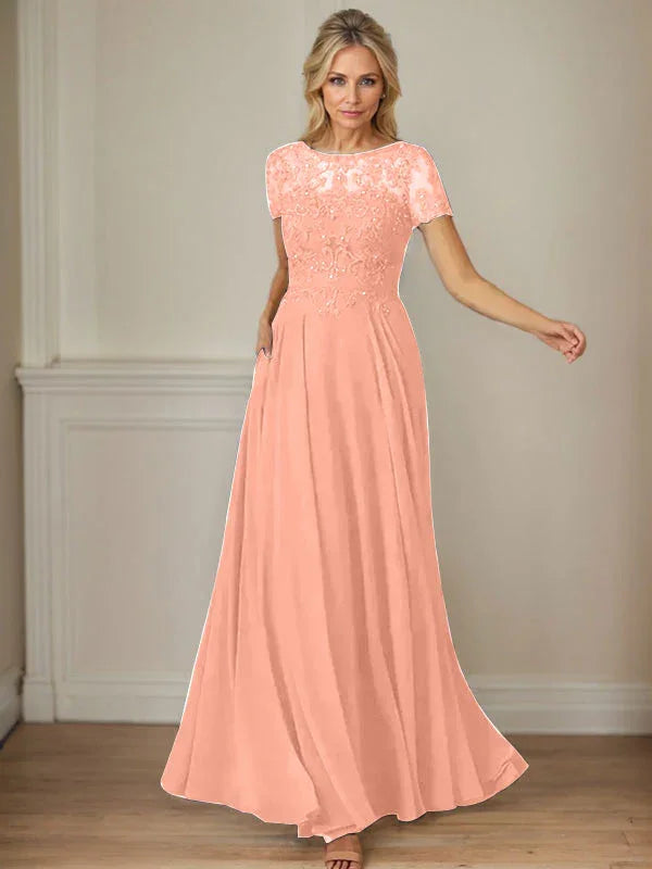 فستان شيفون كحلي داكن برقبة قارب وتطريز بالترتر على شكل حرف A