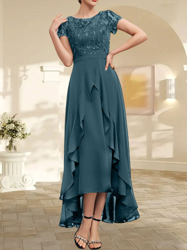 Robe de mère de la mariée en mousseline et dentelle asymétrique illusion à encolure dégagée, coupe en A, avec nœud, volants et paillettes
